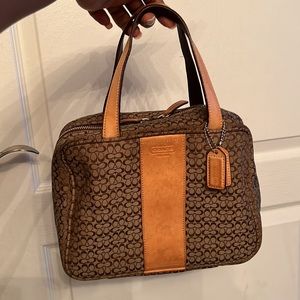 Coach
Brown and Tan Signature Jacquard Toiletry - Travel Train Case Cosmetic bag